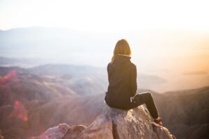 Person in serene contemplation, symbolizing mental health reflection.